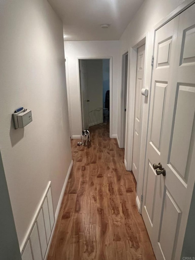 hall featuring hardwood / wood-style flooring