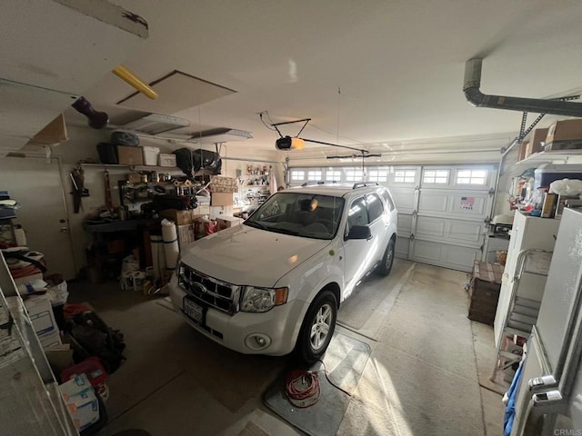 garage featuring a garage door opener