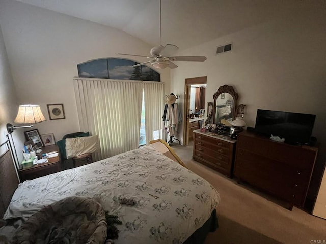 carpeted bedroom featuring ceiling fan and lofted ceiling