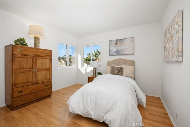 bedroom featuring light wood-type flooring