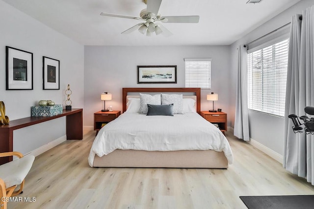 bedroom featuring ceiling fan and light hardwood / wood-style flooring