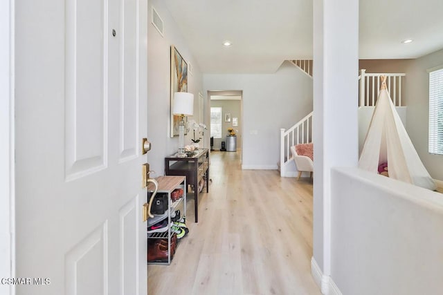 entrance foyer featuring light hardwood / wood-style flooring