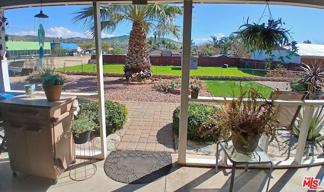 view of patio featuring a mountain view