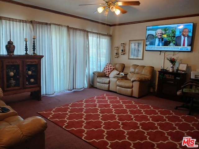 living room with crown molding, ceiling fan, and carpet