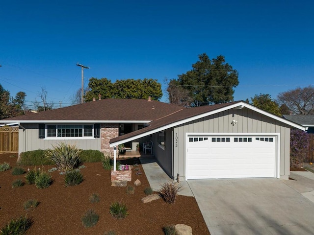 ranch-style house featuring a garage