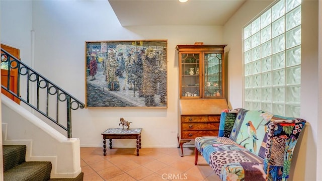 sitting room featuring tile patterned flooring