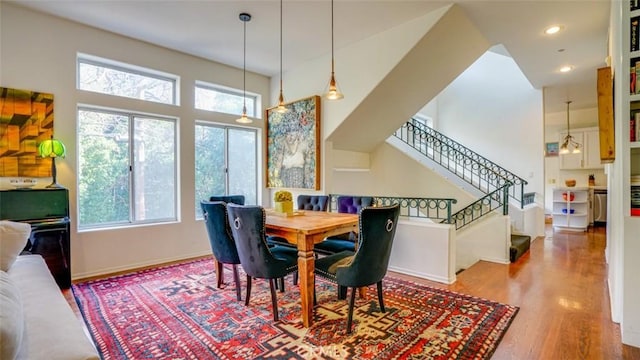 dining space featuring hardwood / wood-style flooring