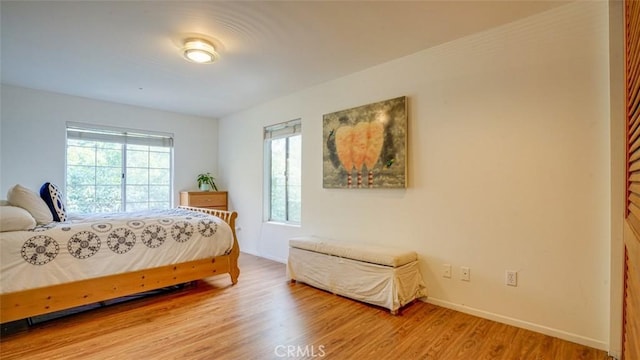 bedroom featuring light wood-type flooring