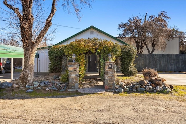 view of front of property with a carport