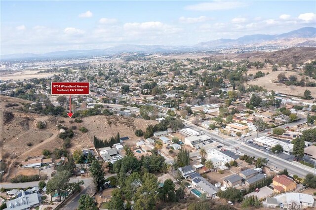 bird's eye view with a mountain view