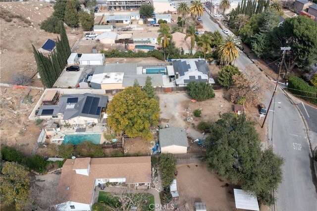 birds eye view of property with a residential view