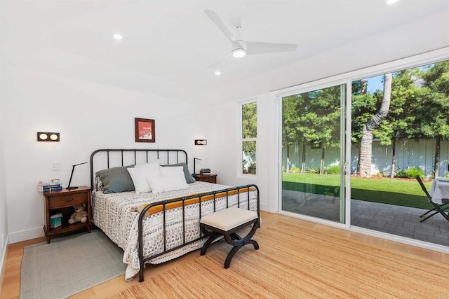 bedroom with access to outside, light hardwood / wood-style floors, and ceiling fan