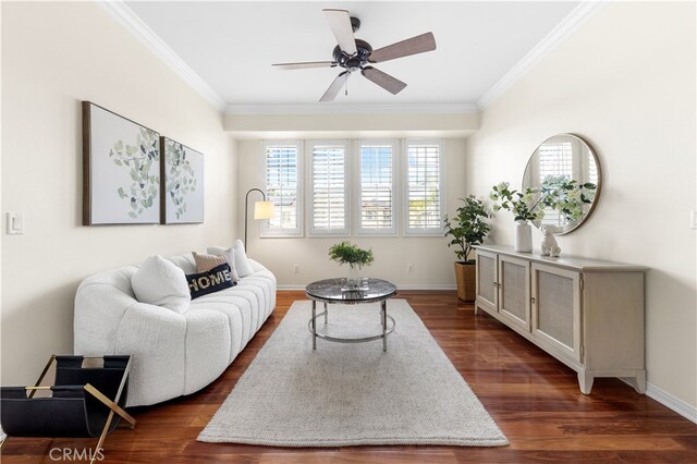 living room featuring ornamental molding, dark hardwood / wood-style floors, and ceiling fan