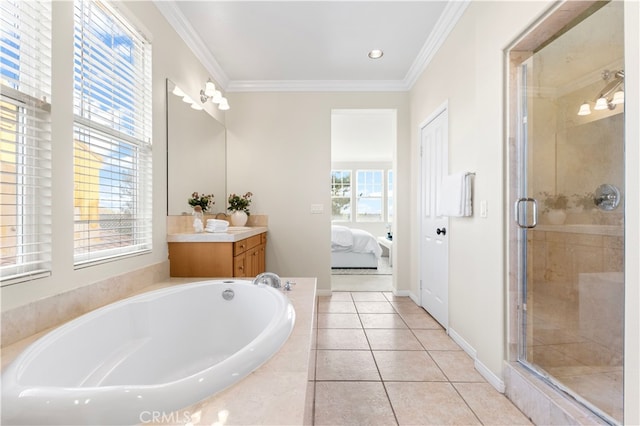 bathroom with tile patterned flooring, ornamental molding, independent shower and bath, and vanity