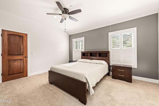 bedroom with light carpet and ceiling fan