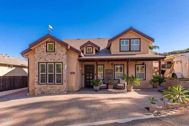 view of front of home featuring covered porch