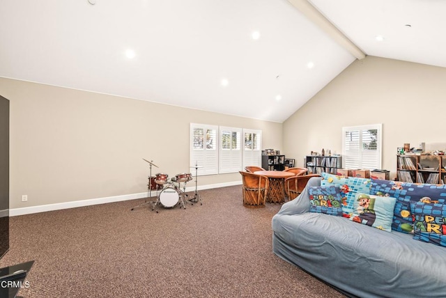 carpeted living room with beam ceiling and high vaulted ceiling