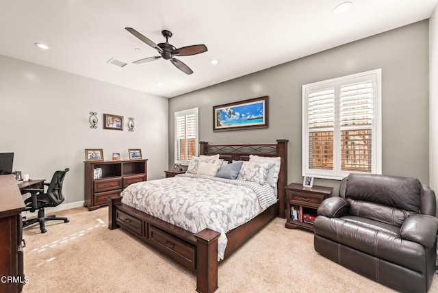 carpeted bedroom featuring ceiling fan