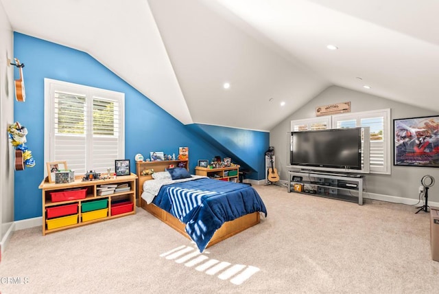 carpeted bedroom with vaulted ceiling