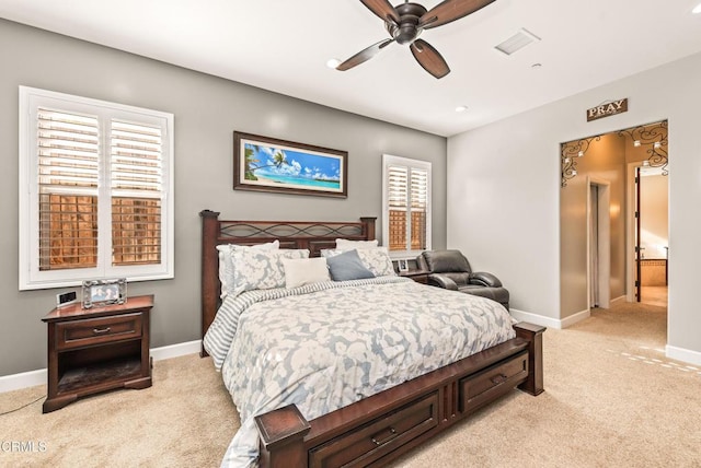 carpeted bedroom with ceiling fan