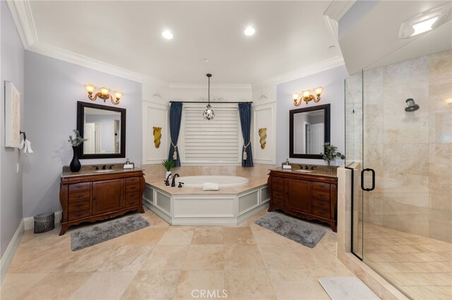 bathroom with vanity, ornamental molding, and plus walk in shower