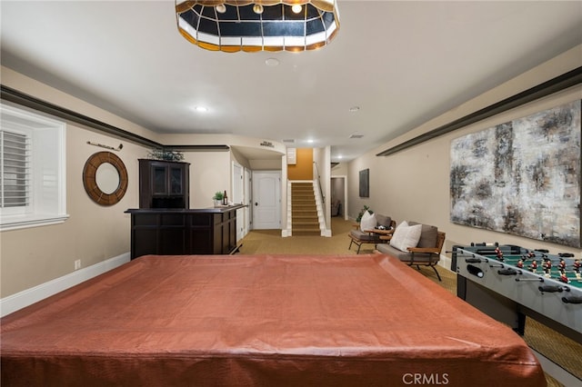 playroom featuring light colored carpet