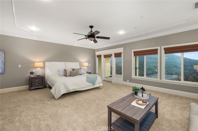 bedroom featuring crown molding and light colored carpet
