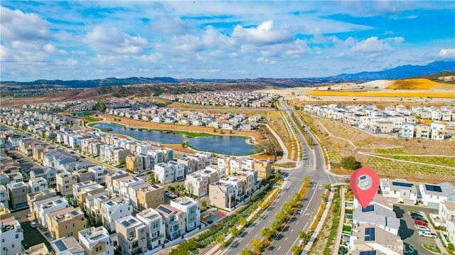 aerial view with a water and mountain view