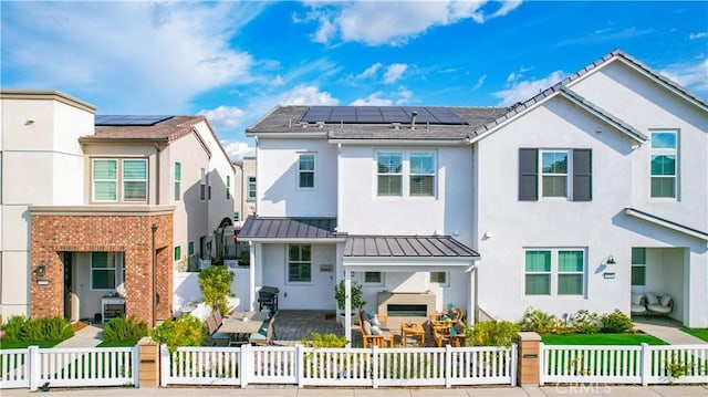 view of front of property with a patio