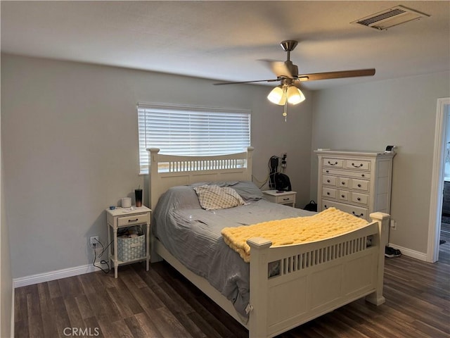 bedroom featuring dark wood-type flooring and ceiling fan