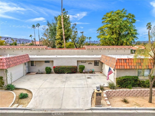 view of front of home featuring a mountain view