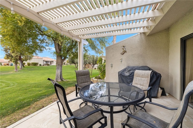 view of patio / terrace featuring area for grilling and a pergola