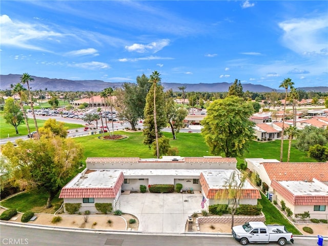 drone / aerial view featuring a mountain view