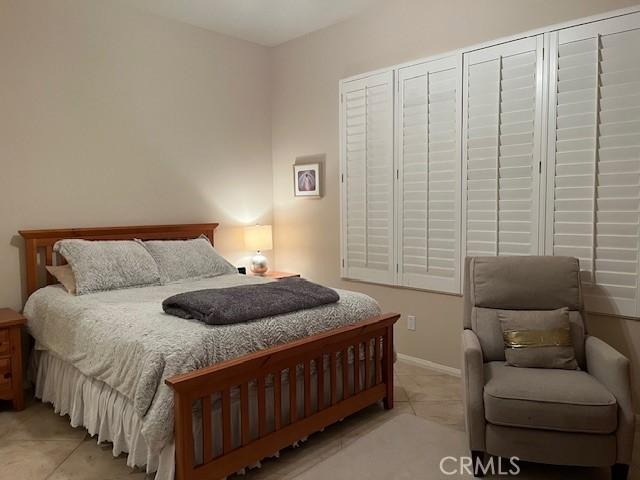 bedroom featuring baseboards