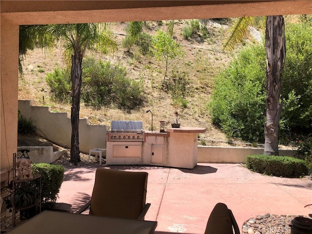 5467 Breckenridge Ave, Banning, CA 92220 - view of patio with an outdoor kitchen
