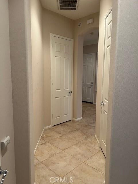 5467 Breckenridge Ave, Banning, CA 92220 - corridor with light tile patterned floors