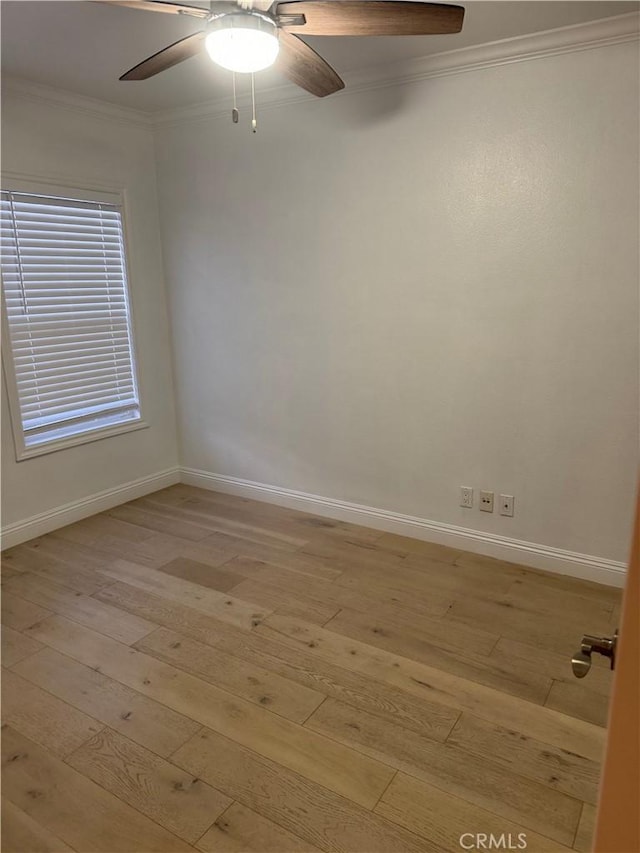 unfurnished room with ceiling fan, ornamental molding, and light hardwood / wood-style flooring