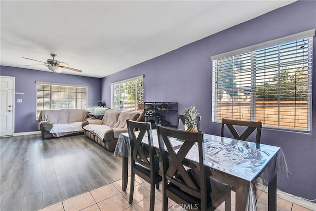 dining area featuring ceiling fan and light hardwood / wood-style floors