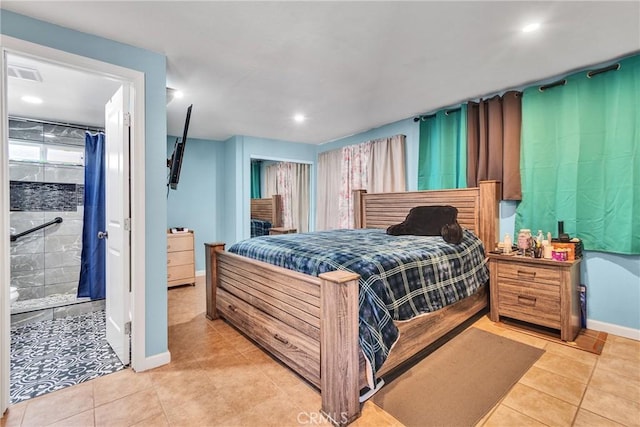 bedroom featuring light tile patterned floors