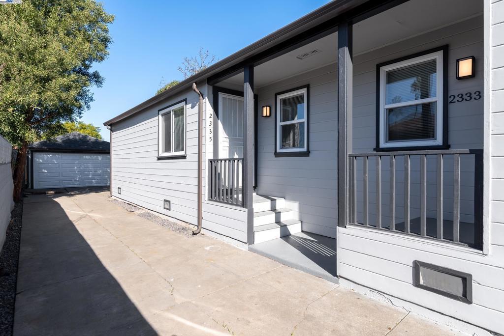 exterior space featuring an outbuilding and a garage