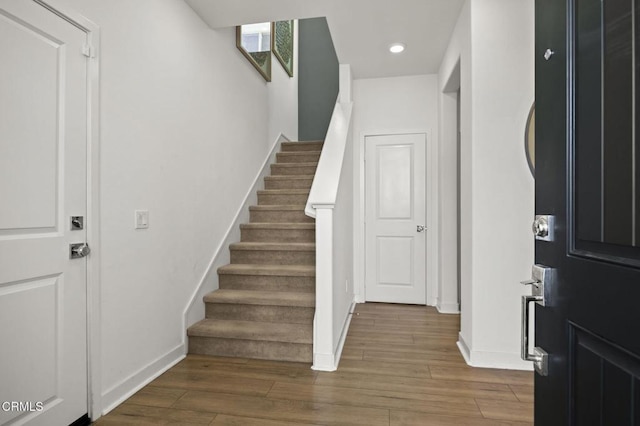 entrance foyer with dark hardwood / wood-style flooring