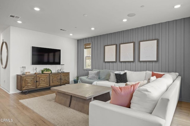 living room with light hardwood / wood-style floors