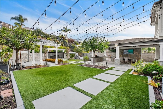 view of yard featuring a pergola and a patio area