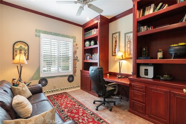 office area with crown molding, light tile patterned flooring, built in features, and built in desk