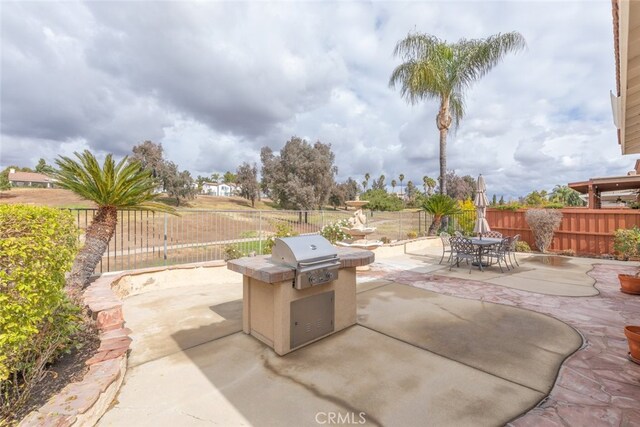 view of patio with grilling area