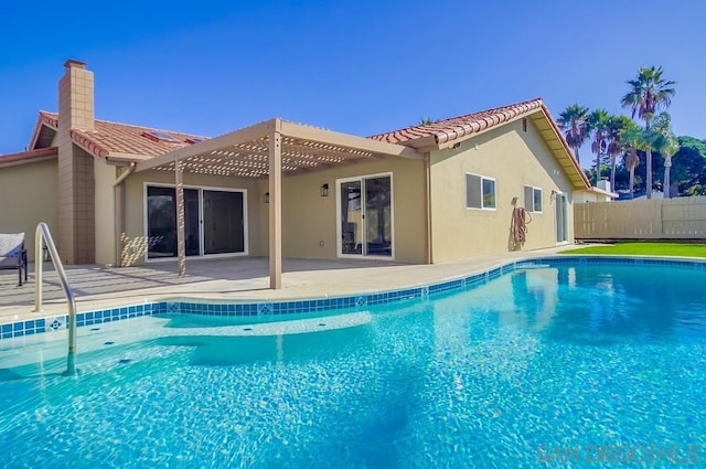 view of pool featuring a pergola and a patio