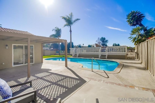 view of pool featuring a patio area