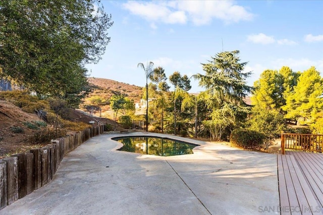 view of pool with a mountain view