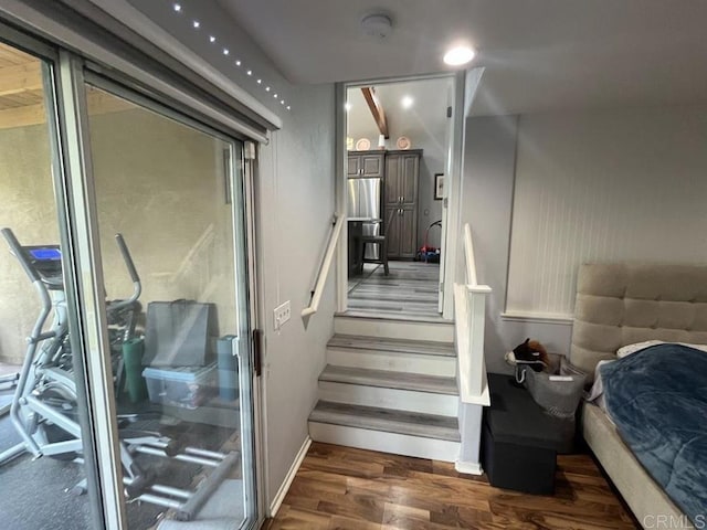 stairway with wood-type flooring