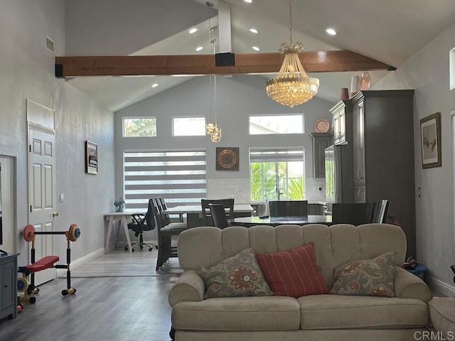 living room featuring beamed ceiling, high vaulted ceiling, an inviting chandelier, and light wood-type flooring